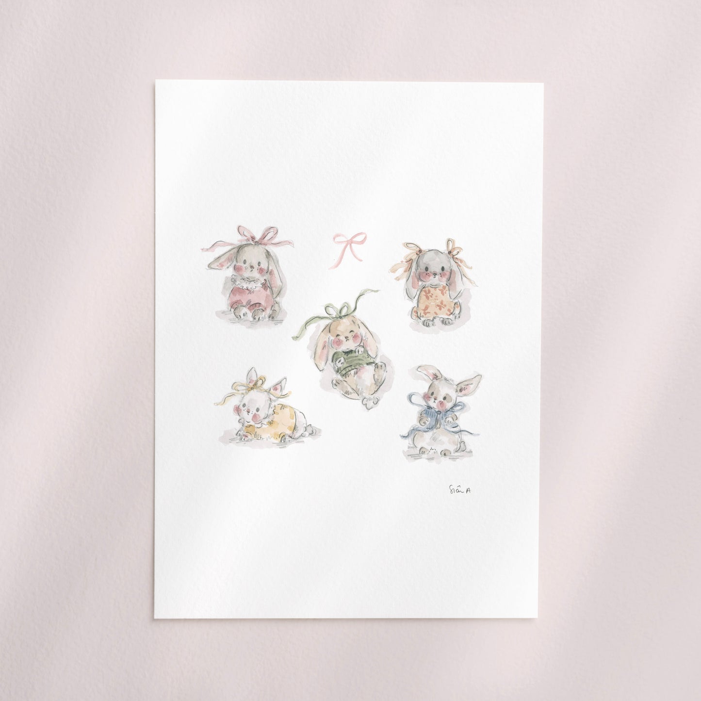 "Baby Bow Bunnies Print"

A hand illustrated watercolour fine art print by Siân Alexia Paine