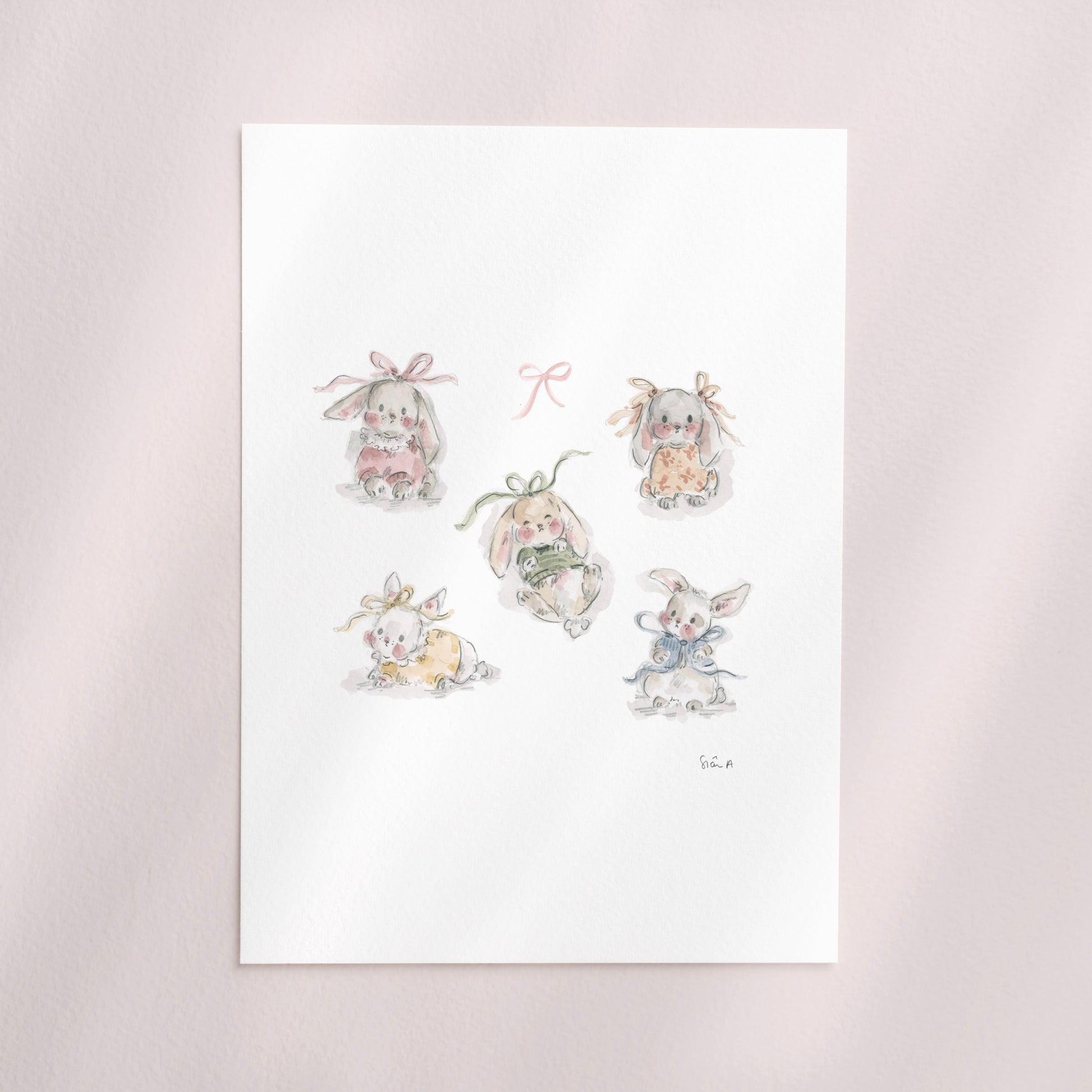 "Baby Bow Bunnies Print"

A hand illustrated watercolour fine art print by Siân Alexia Paine